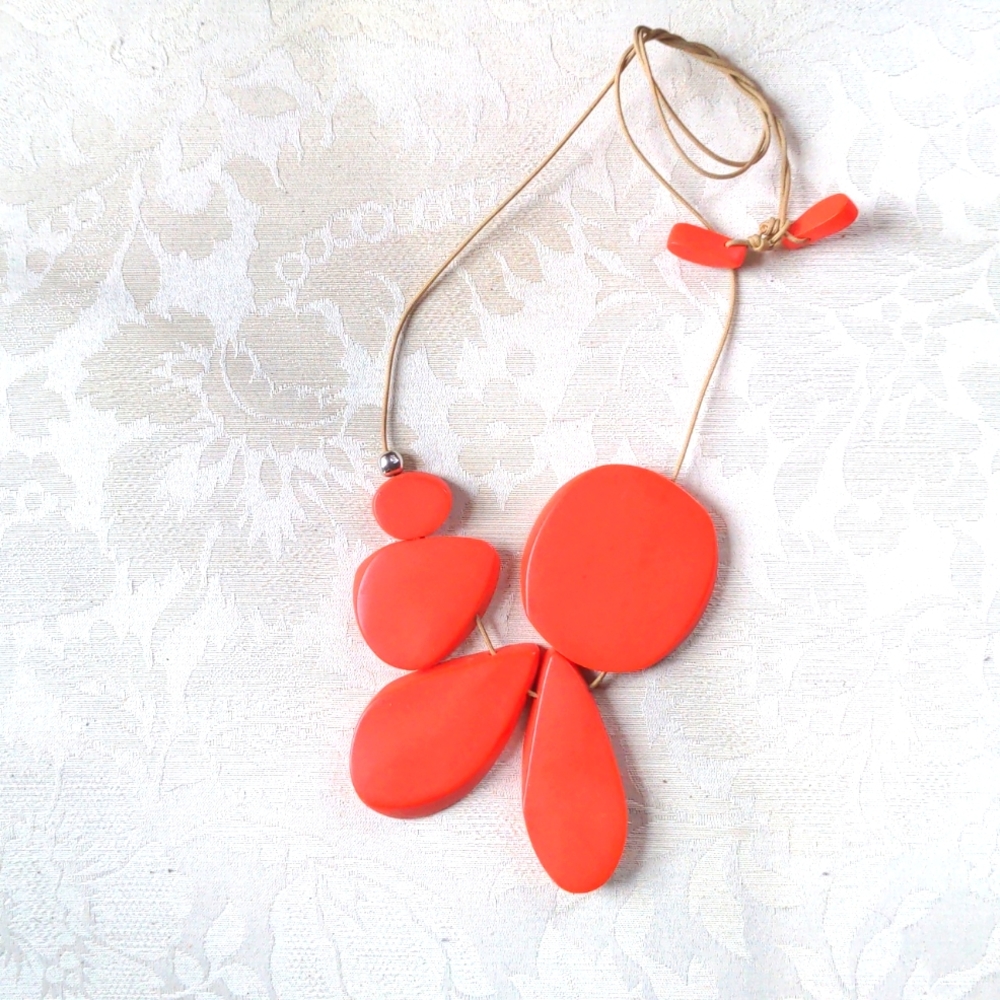 Necklace by Dinosaur Designs  Coral color. Resin beads. Cord = 41 in long